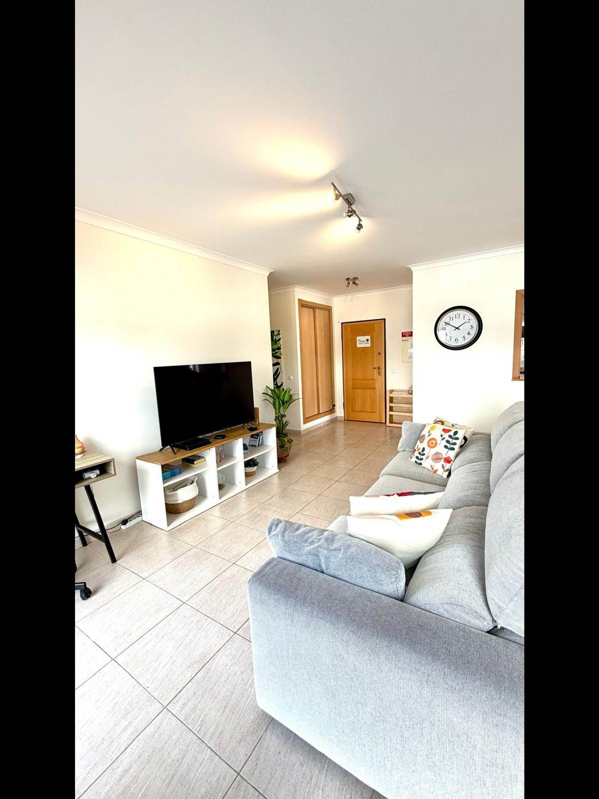 Living room with sofa and TV