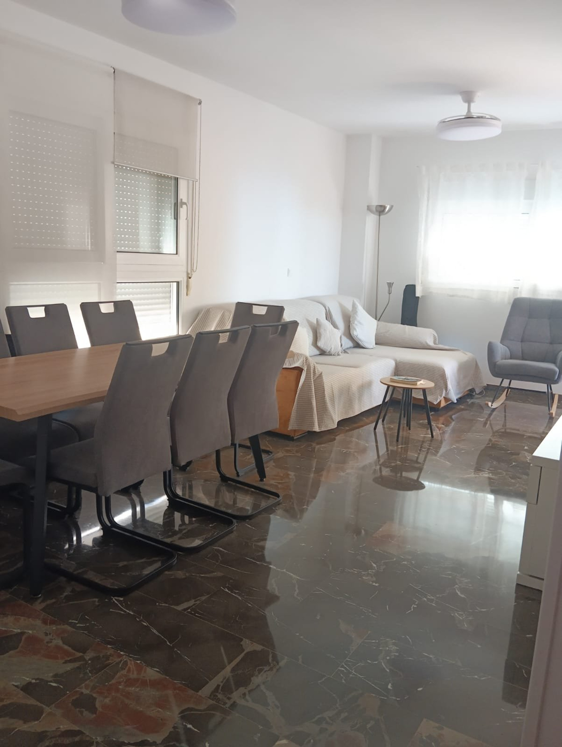 Living room with sofa and dining table
