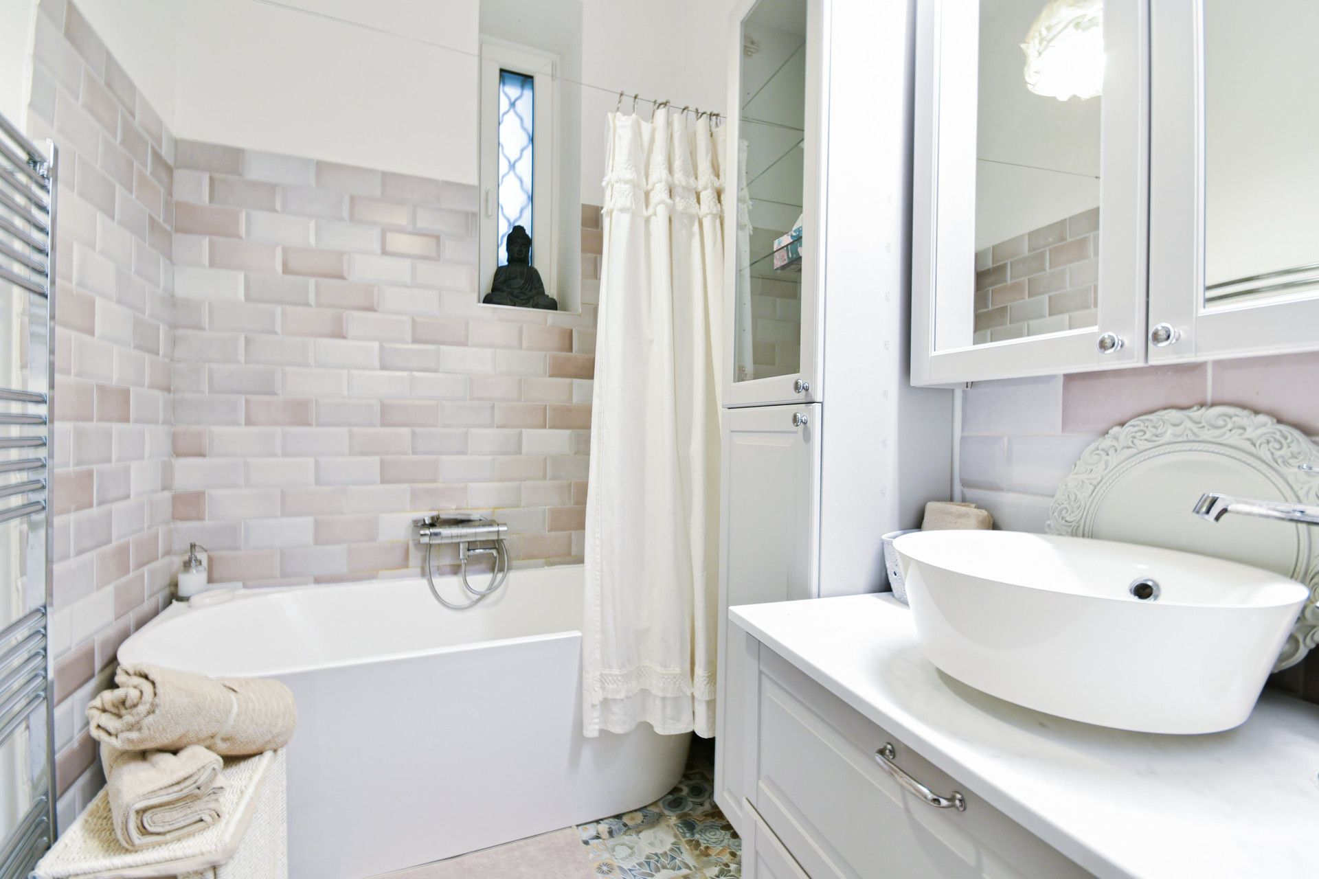 Bathroom with tub and vanity