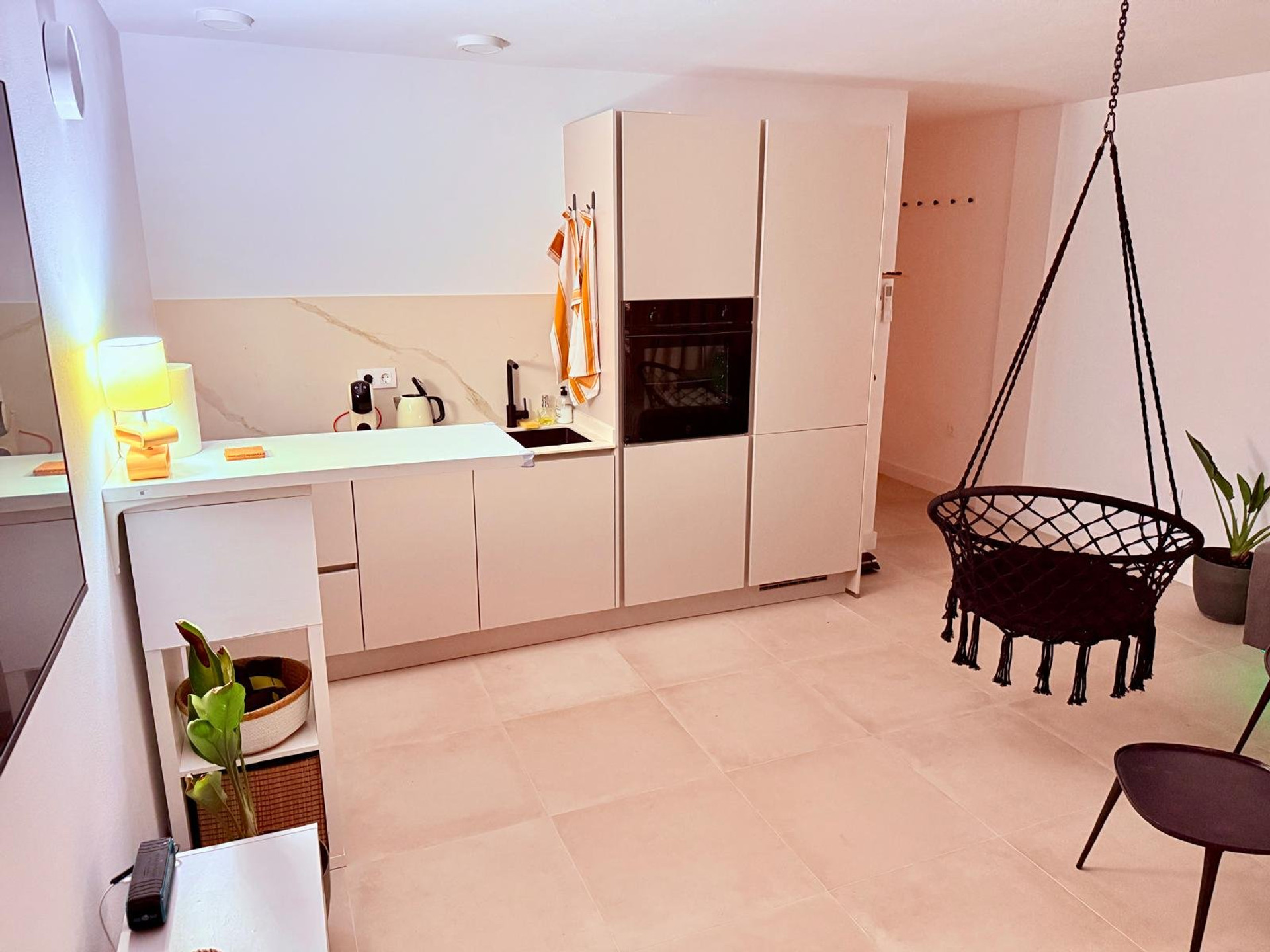 Kitchen area with hanging chair