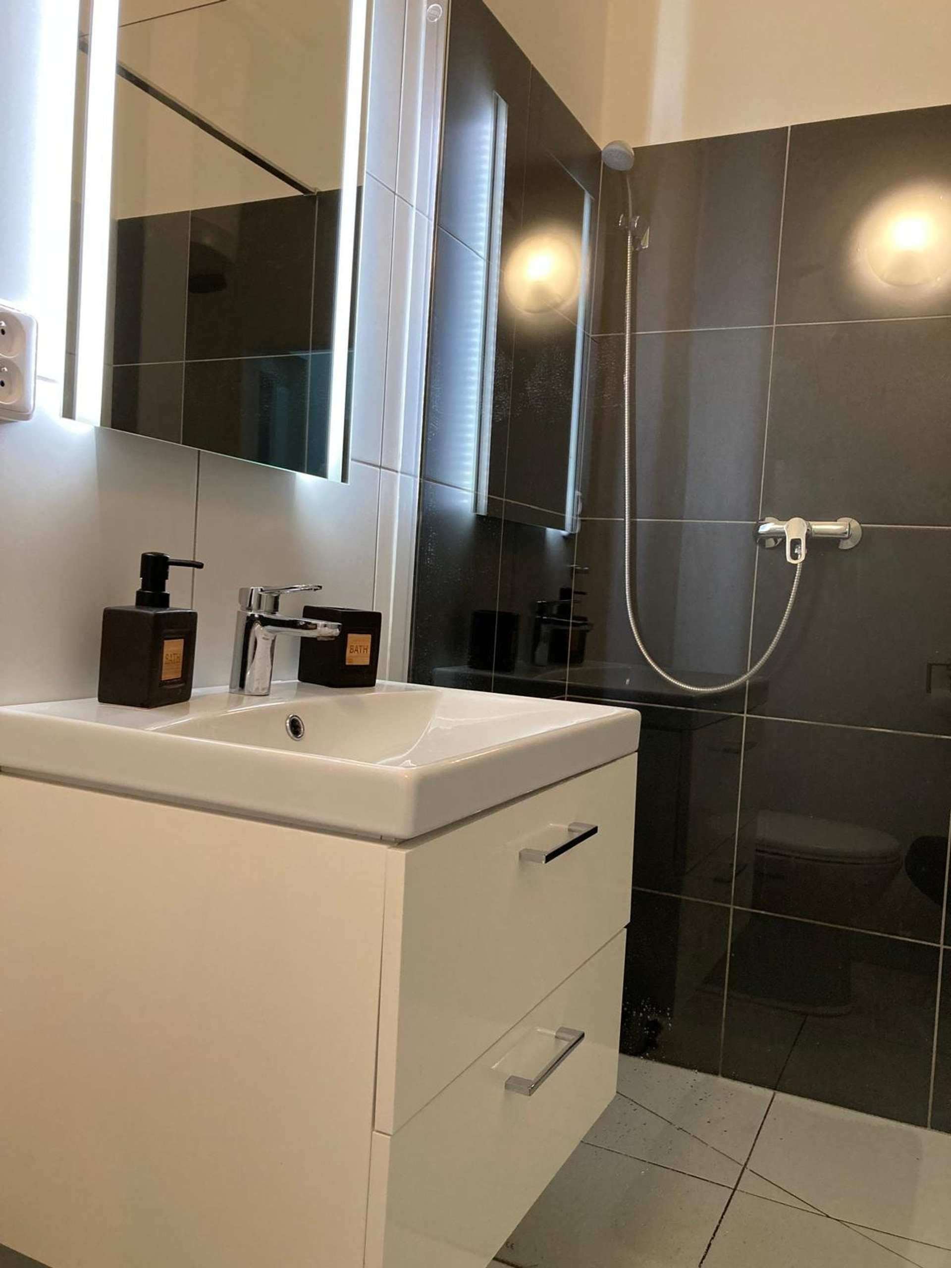 Bathroom with sink and shower