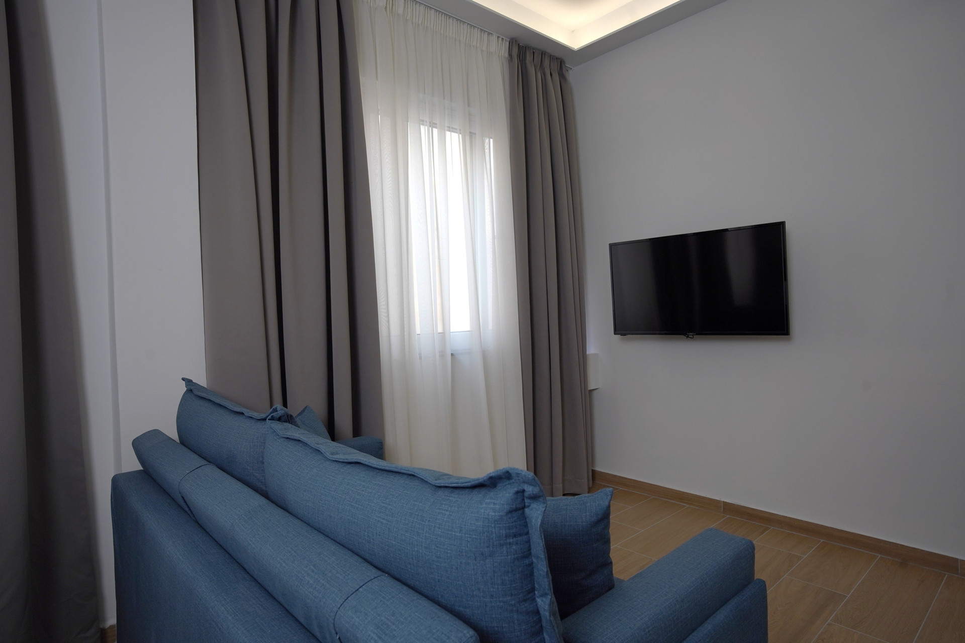 Watch your favourite TV shows and doze off in the serene living room.