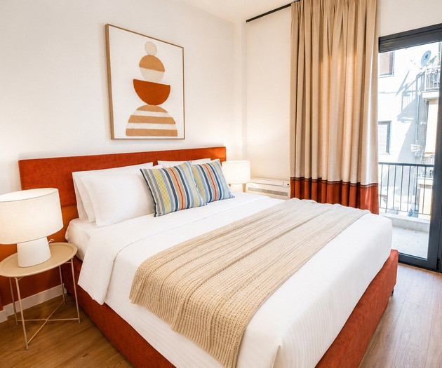 Bedroom with balcony door