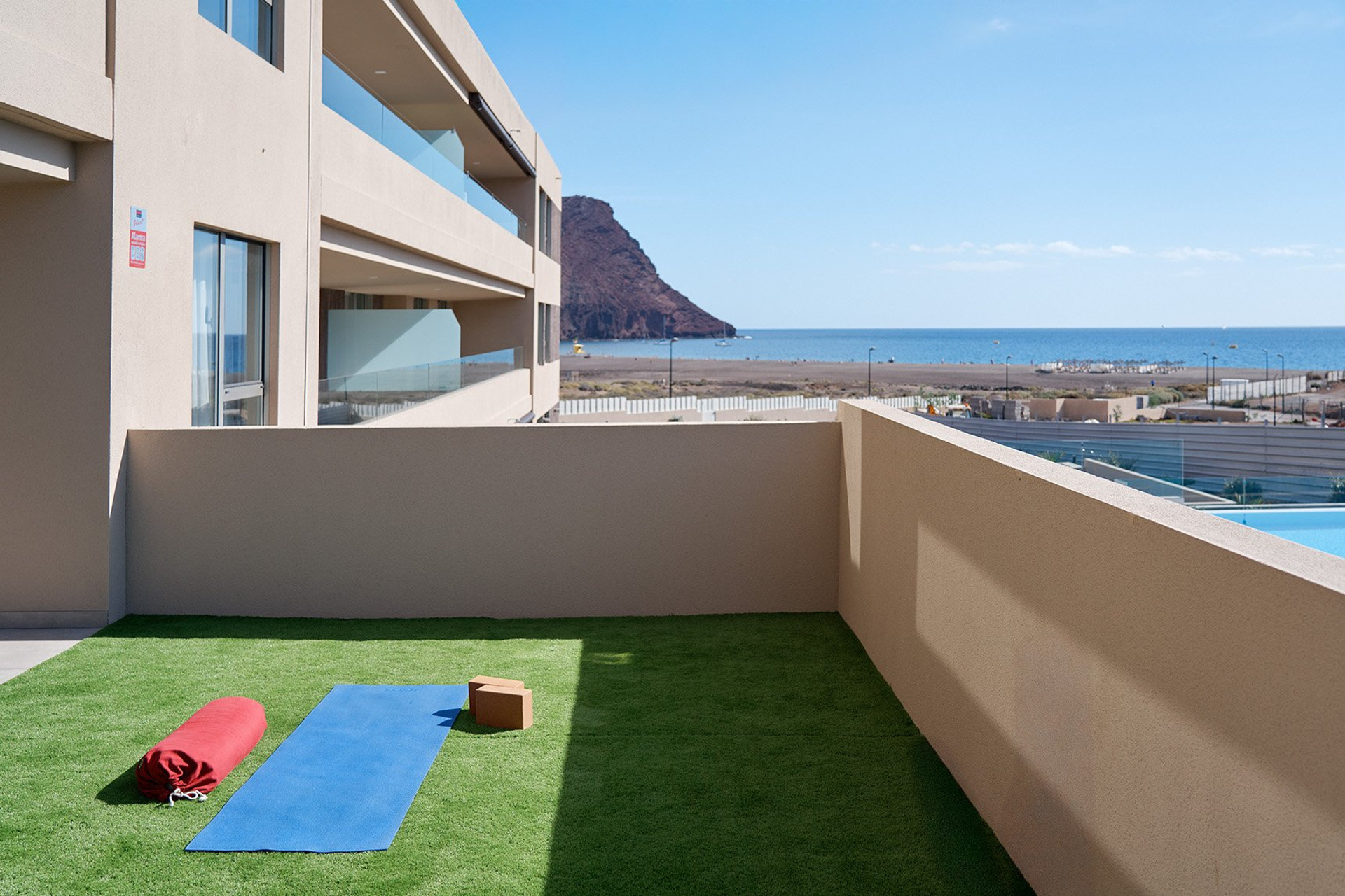Rooftop terrace yoga area sea view