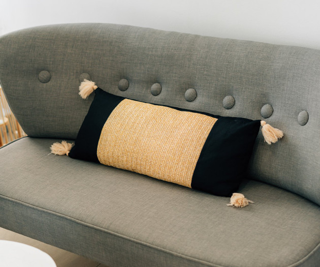 Sofa with tassel cushion