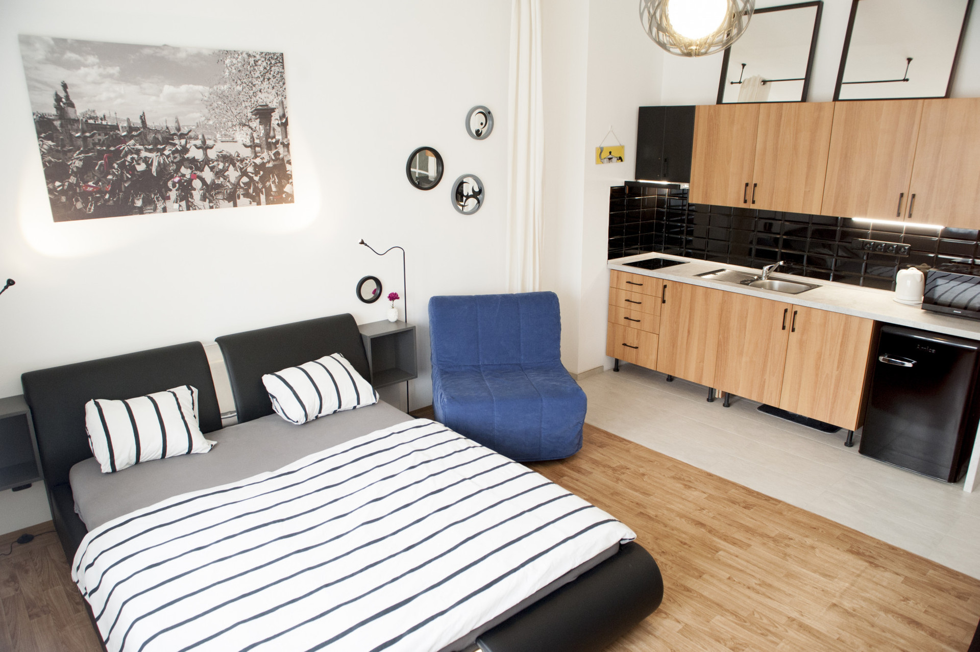 Modern room with qeen size bed, violet-blue seat which you can fold-up in single bed /with really comfy mattress/