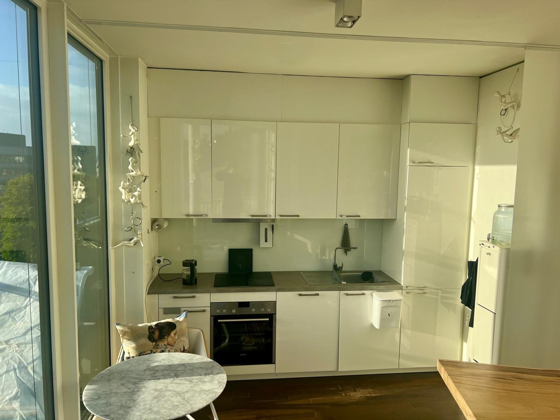 Modern white kitchen with appliances
