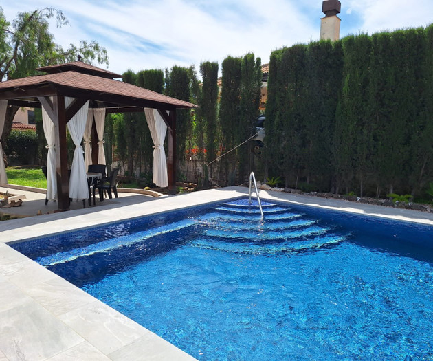 Pool with gazebo and steps