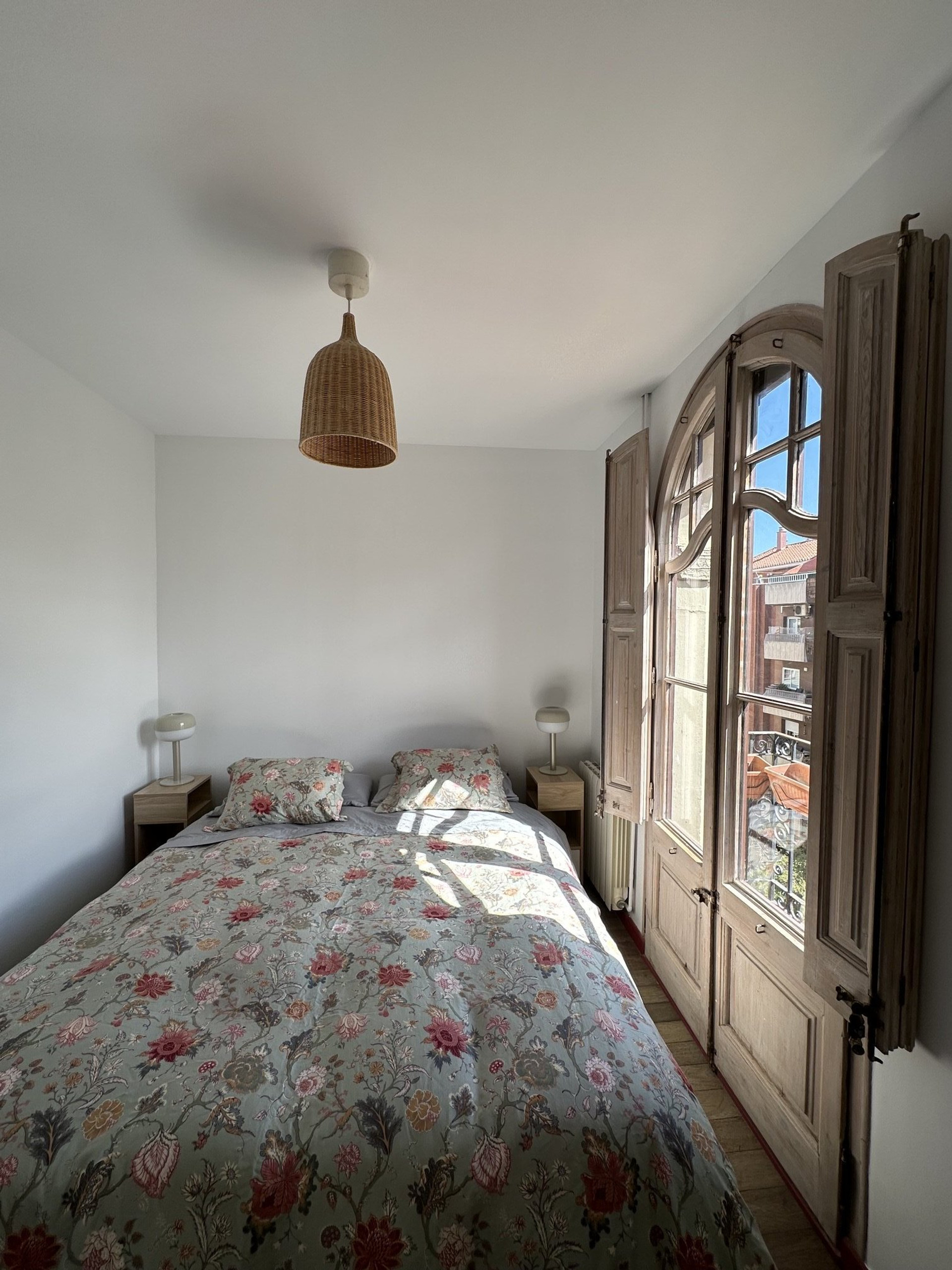 Master bedroom with ornate balcony doors