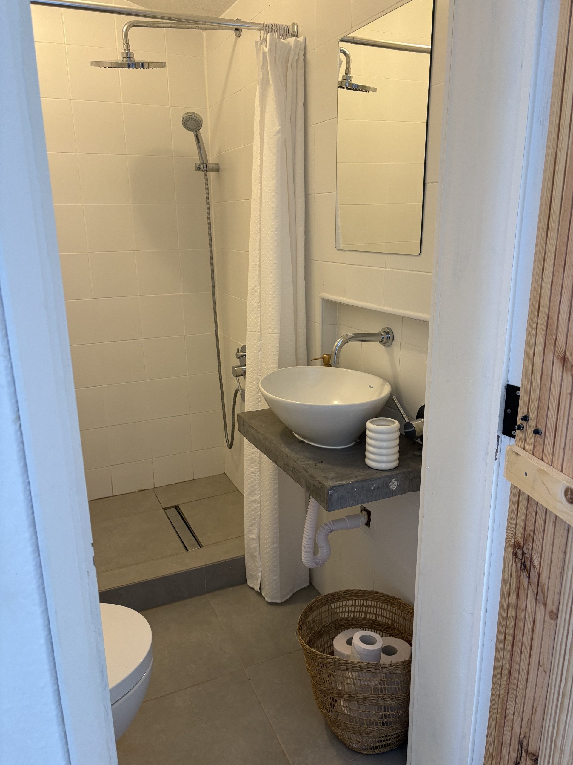 Bathroom with shower and sink
