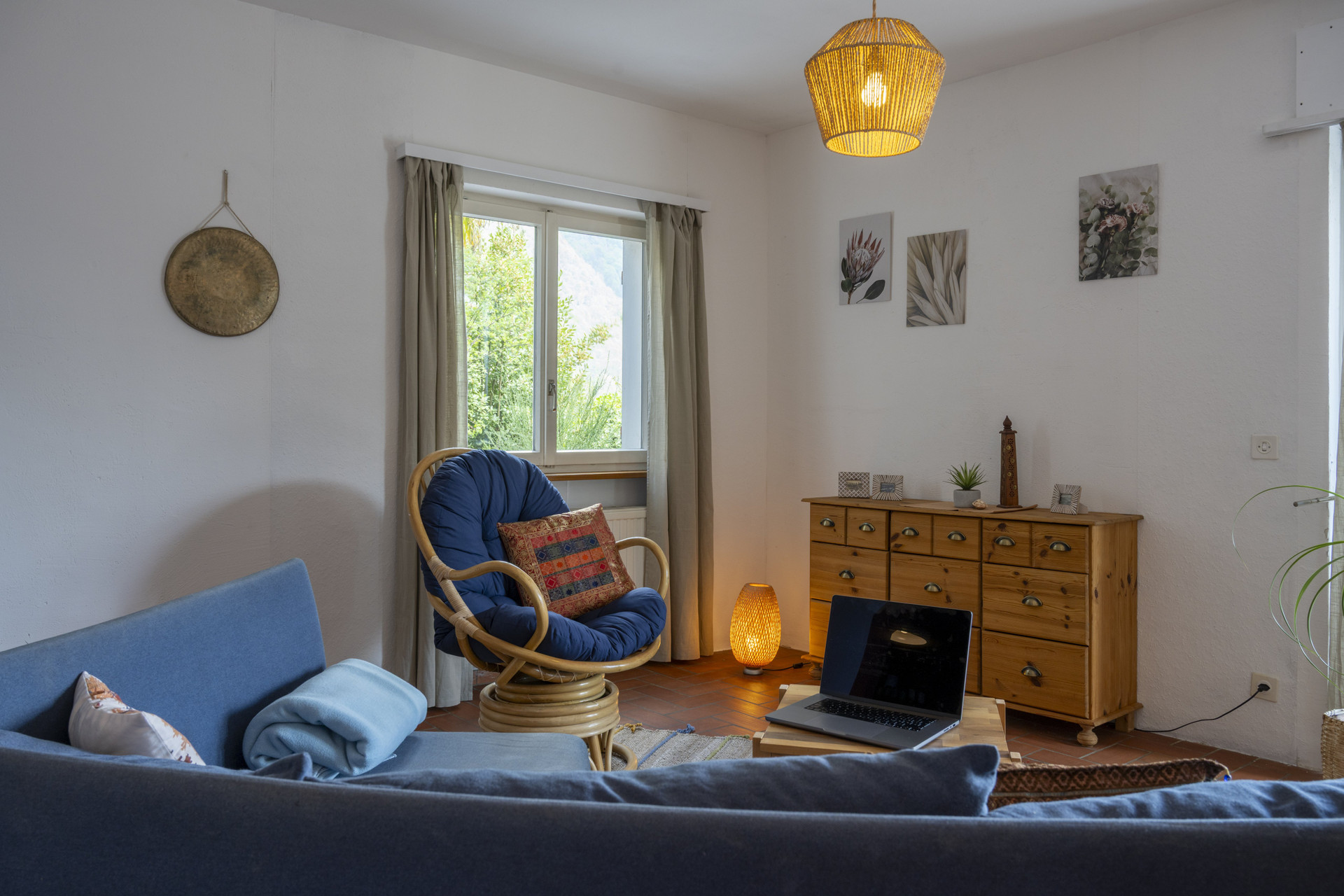 Cozy living room with rattan chair