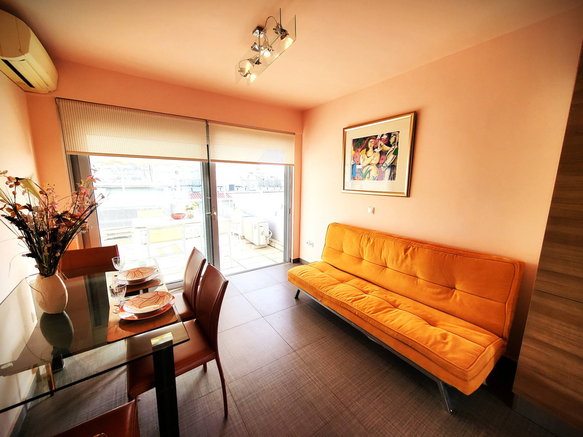 Living dining area with balcony access