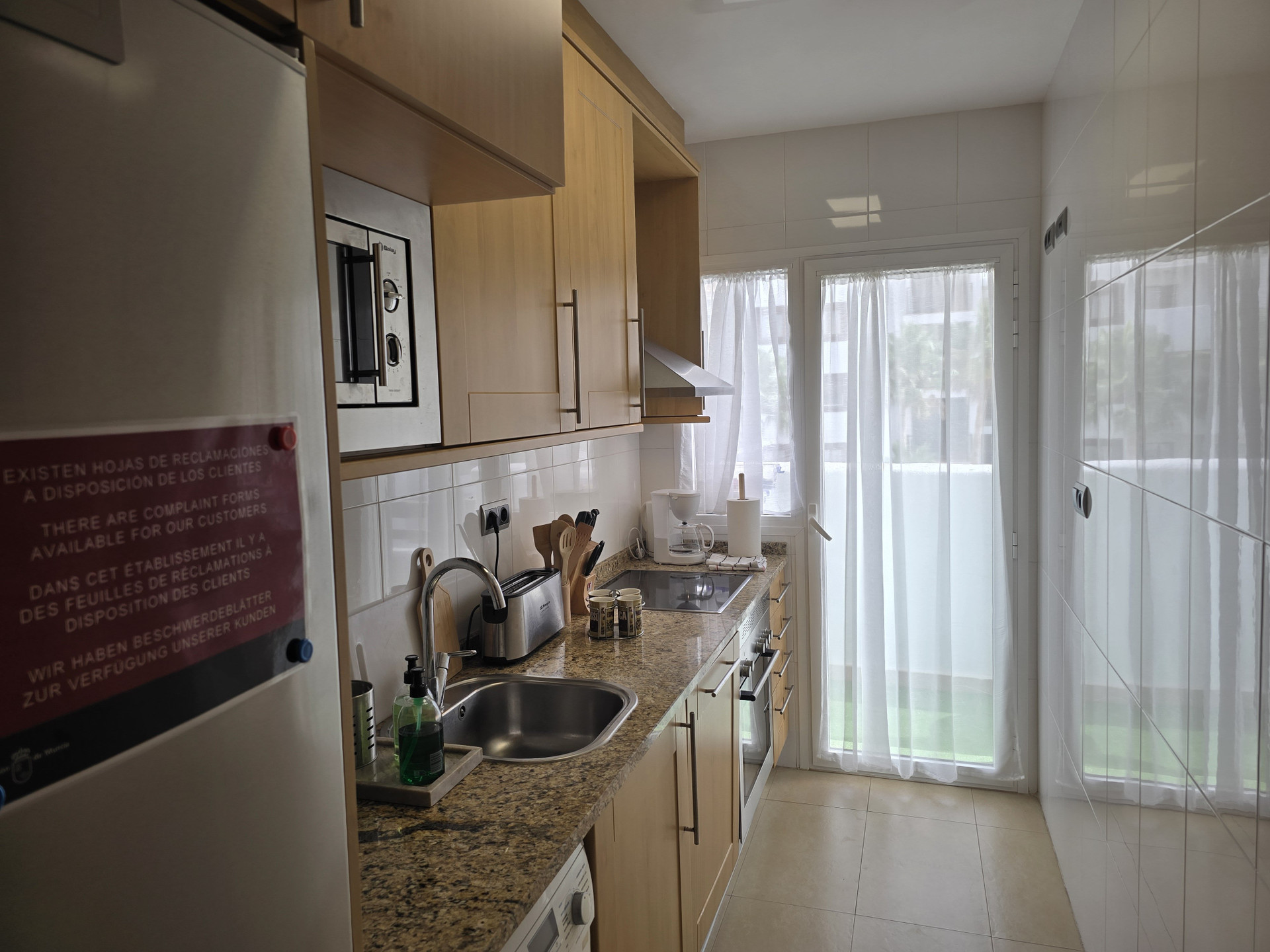 Kitchen with balcony view