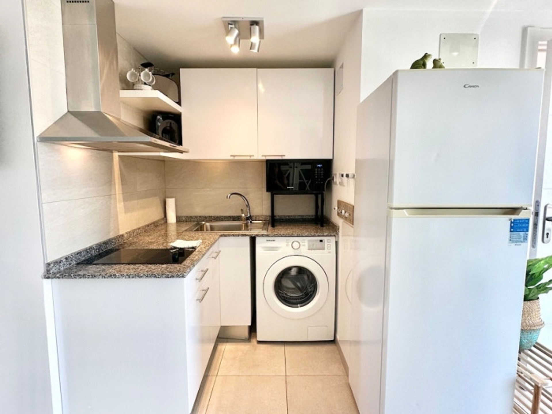 White kitchen with washing machine