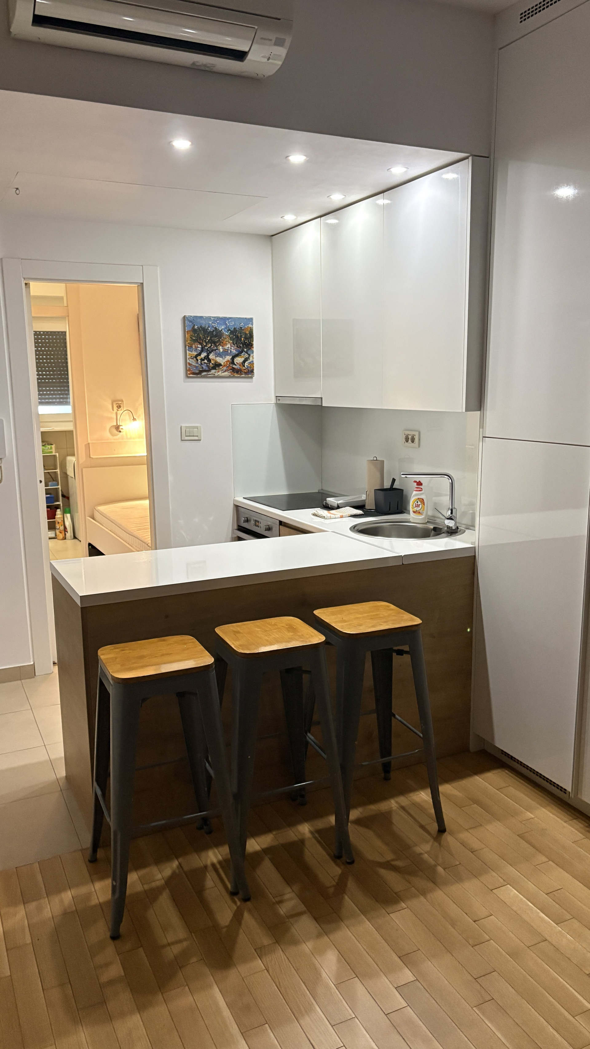 Kitchen with breakfast bar stools