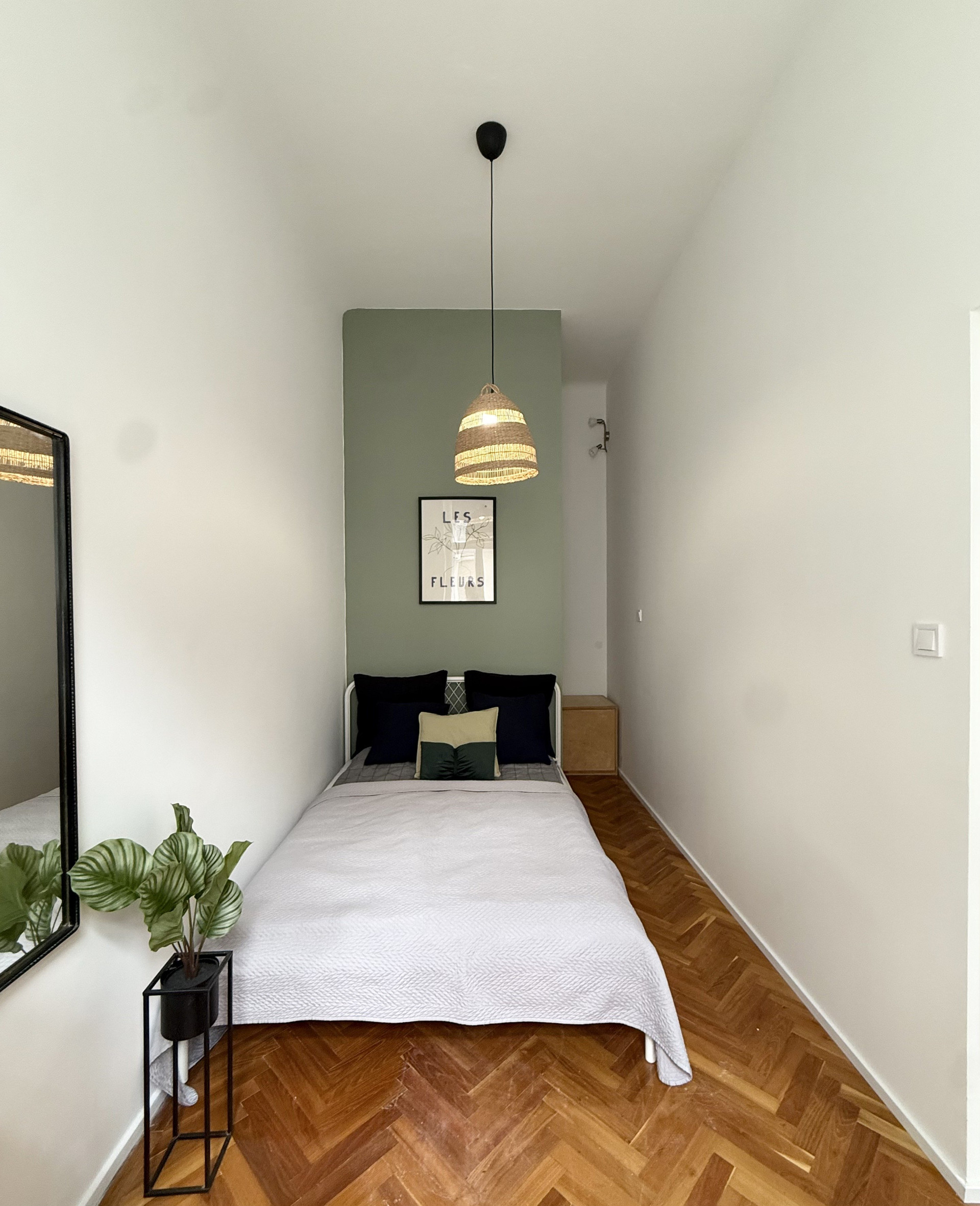 Bedroom with rattan pendant light