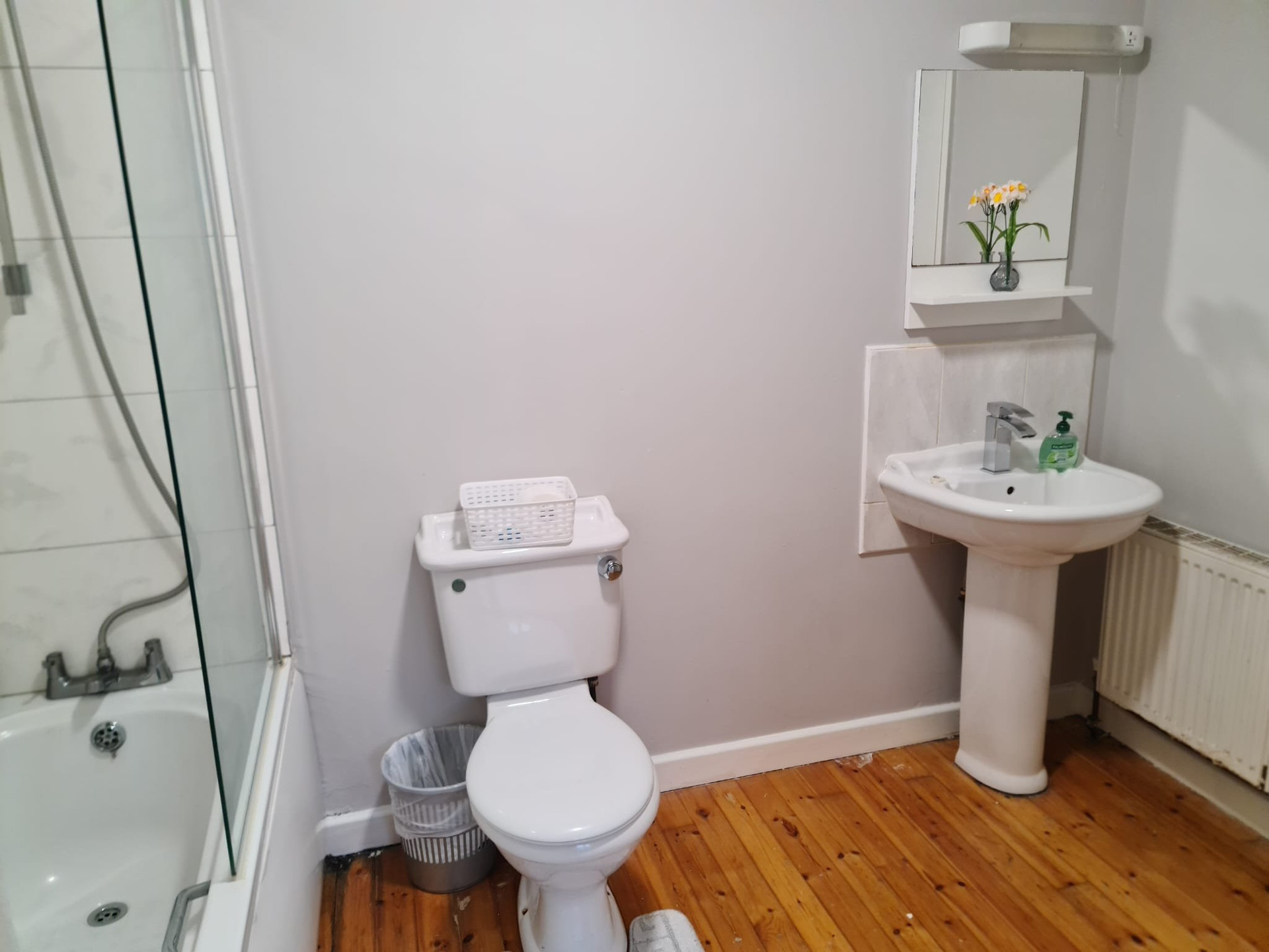 Bathroom with bath shower toilet sink