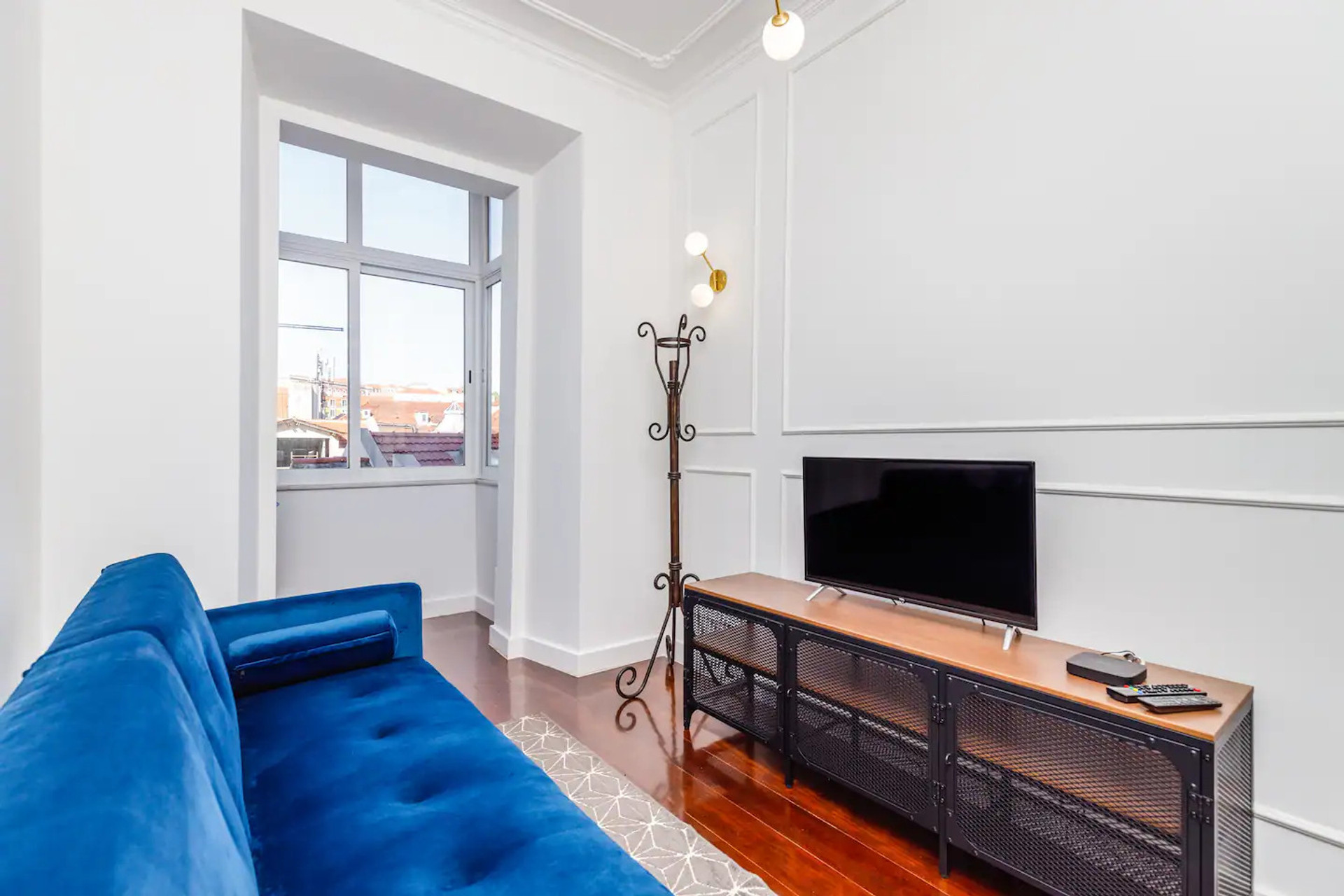 Living room sofa TV large window