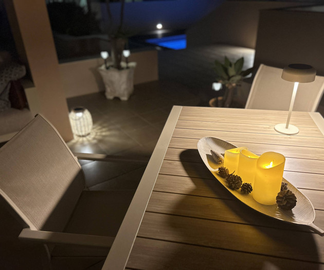 Terrace dining table at night