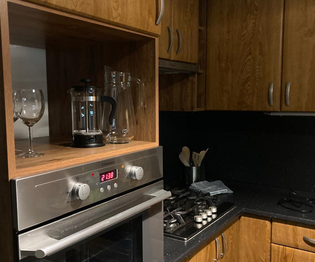 Kitchen with oven and hob