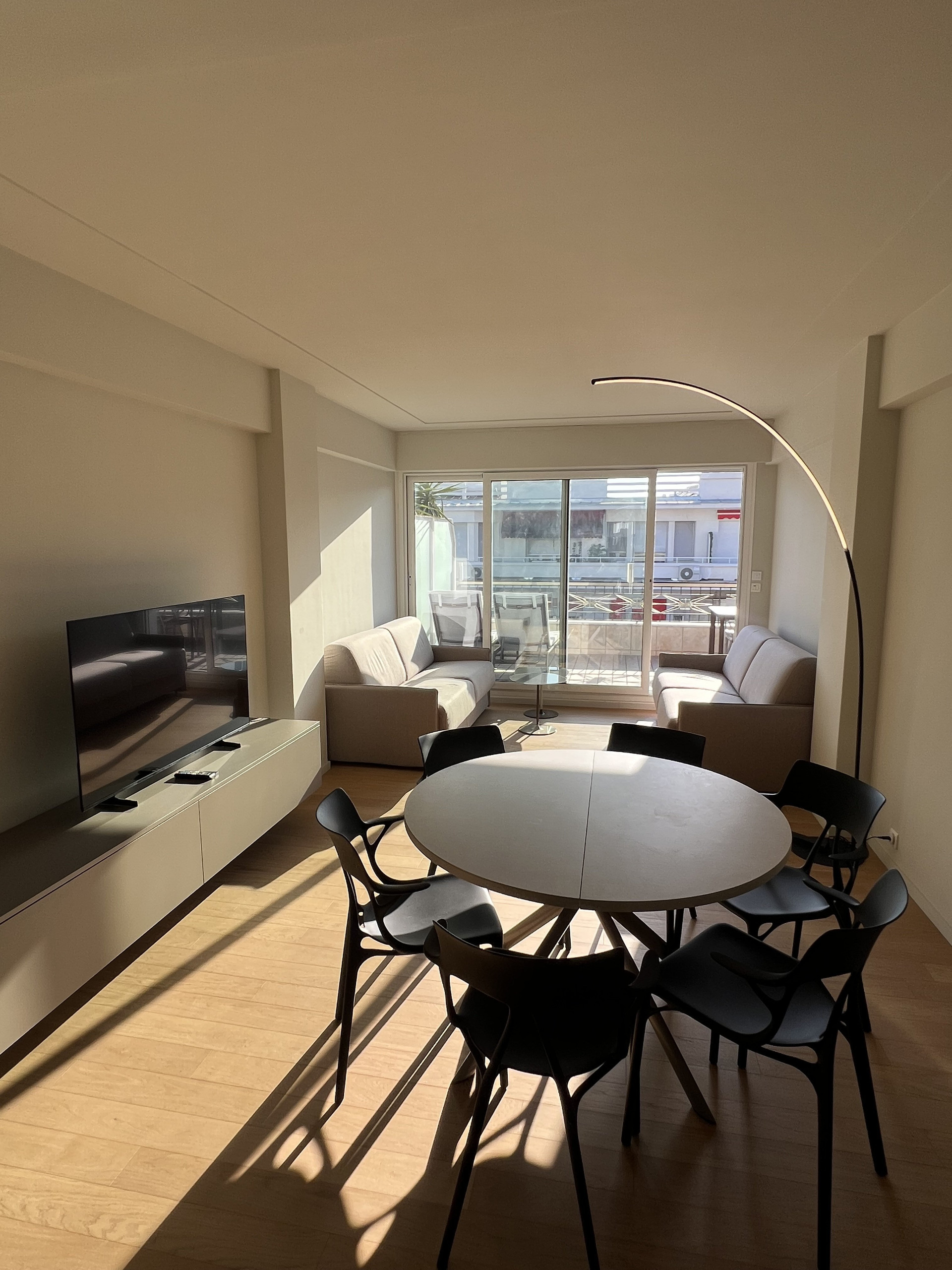 Open living dining area sunlit
