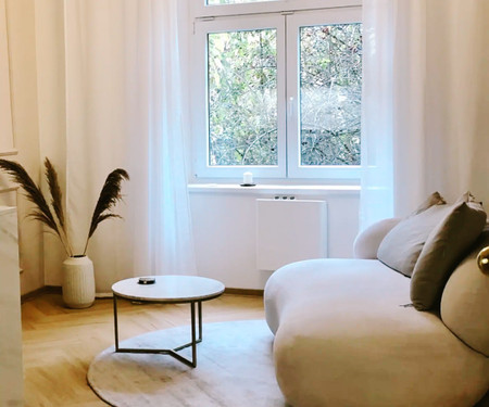 Renovated cosy apartment with garden