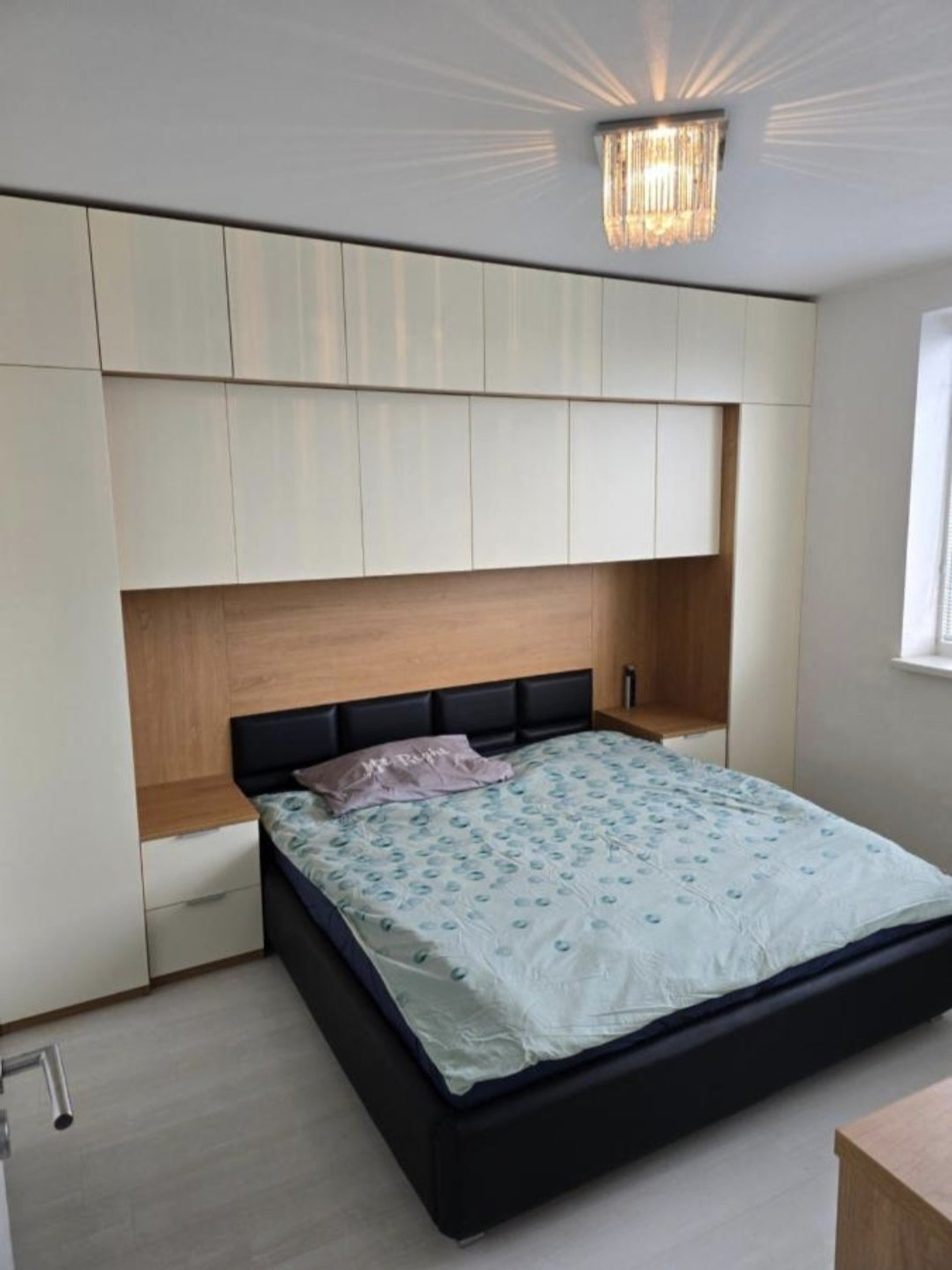 Bedroom with built-in wardrobe storage