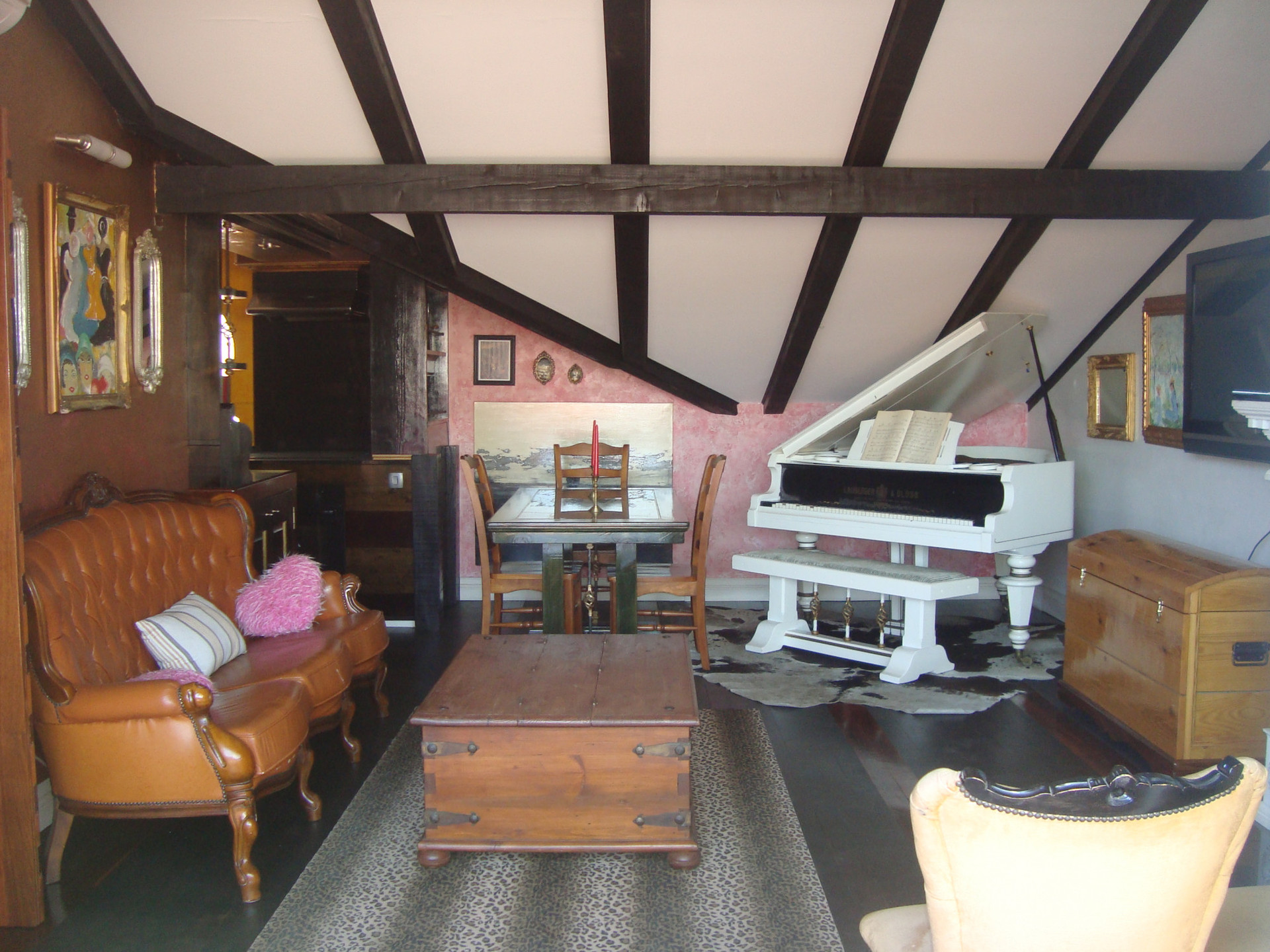 Eclectic living room with grand piano