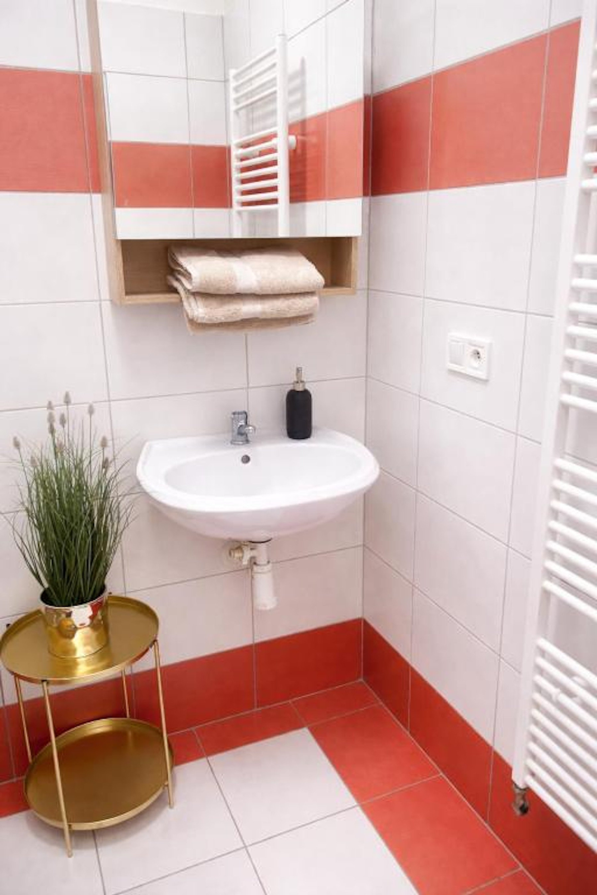 Bathroom with sink and towels