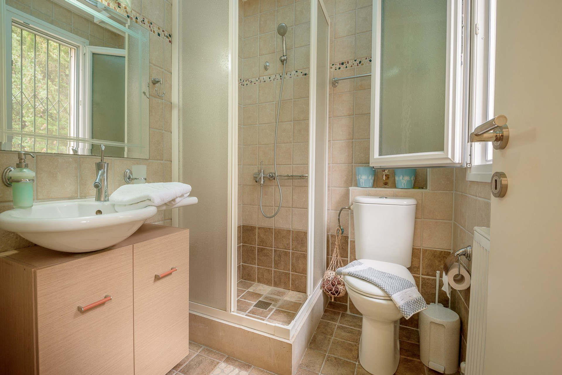 Bathroom with shower and sink