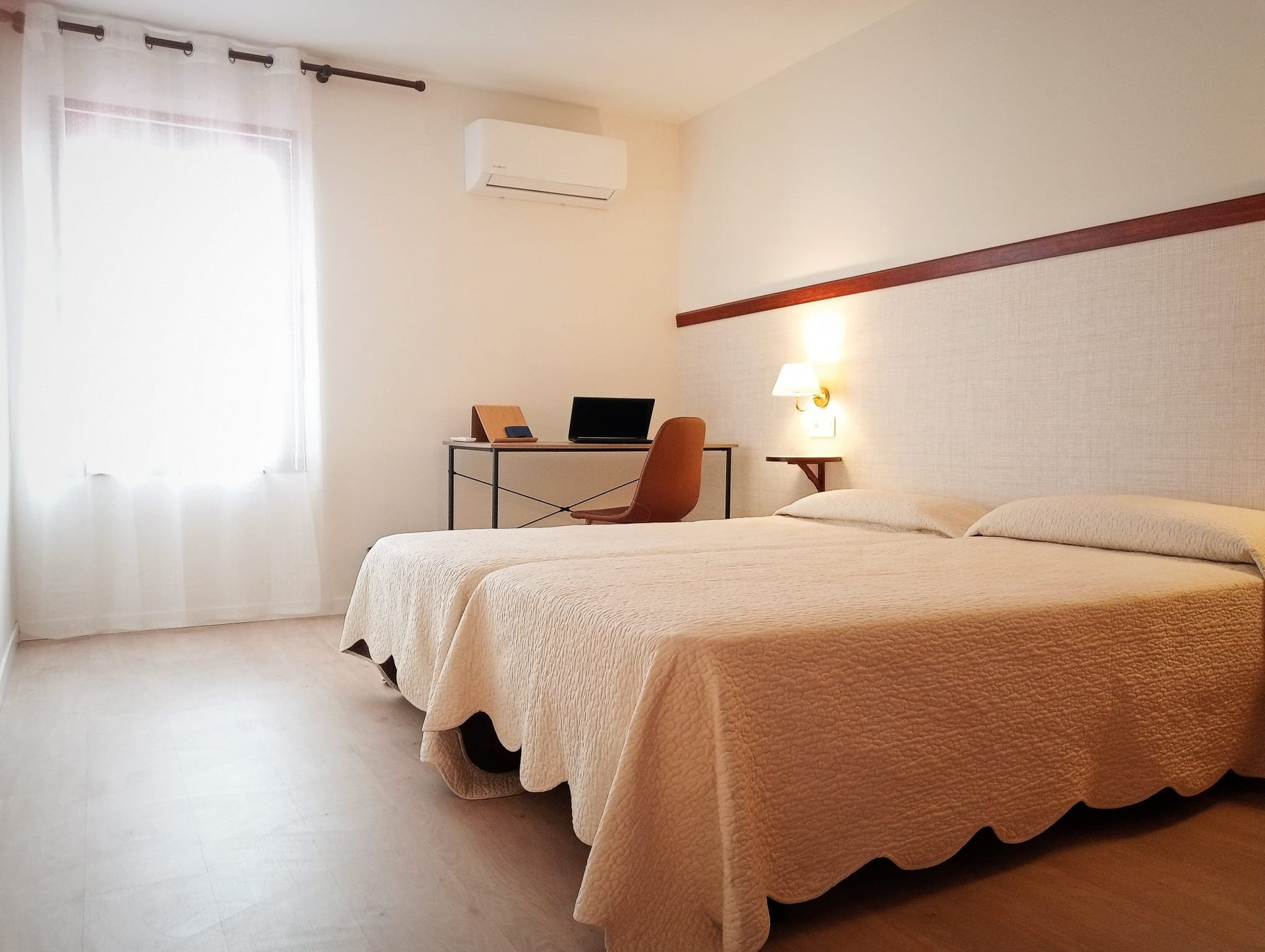 Bright bedroom with twin beds