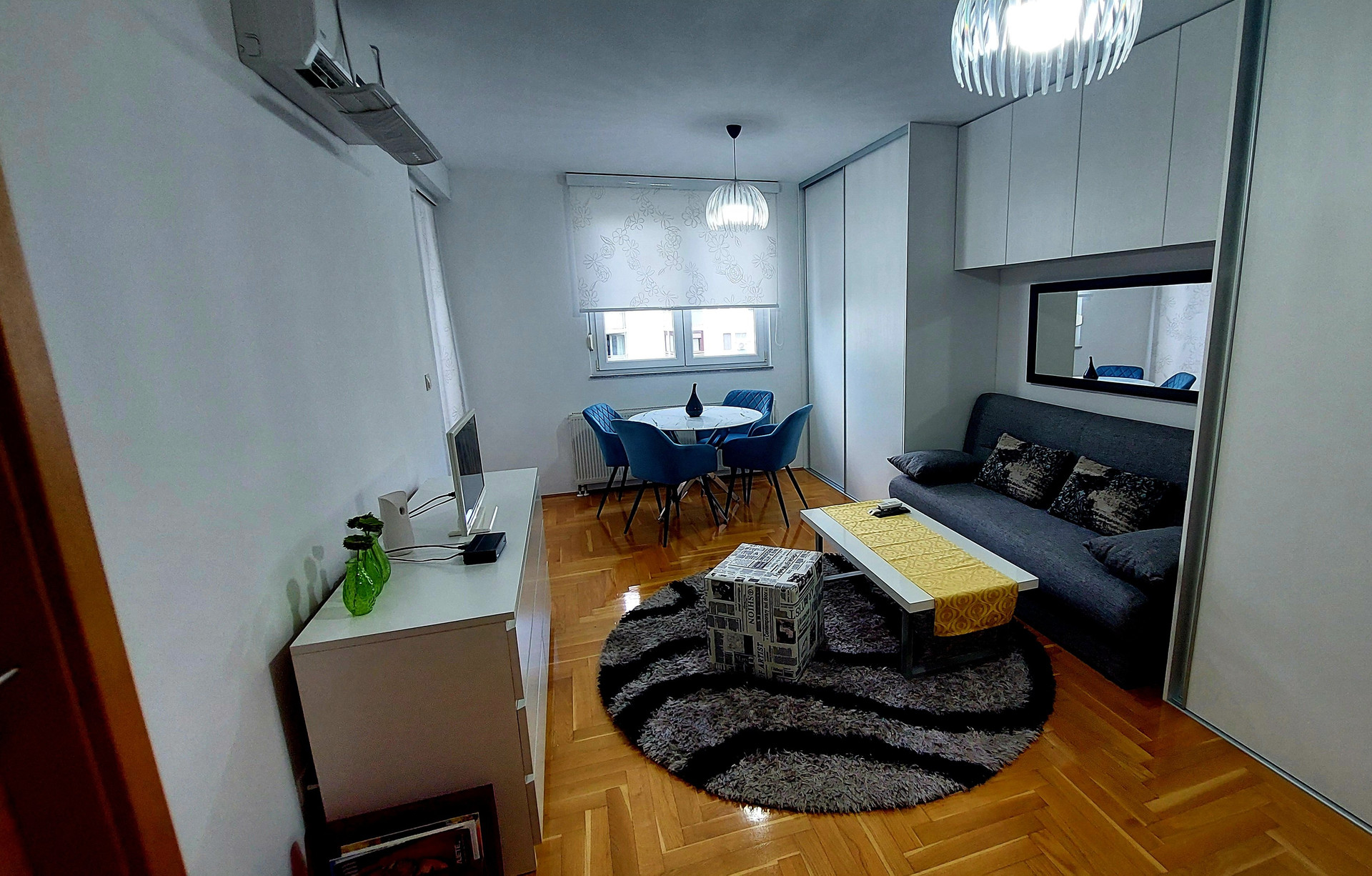 Living room with sofa and dining