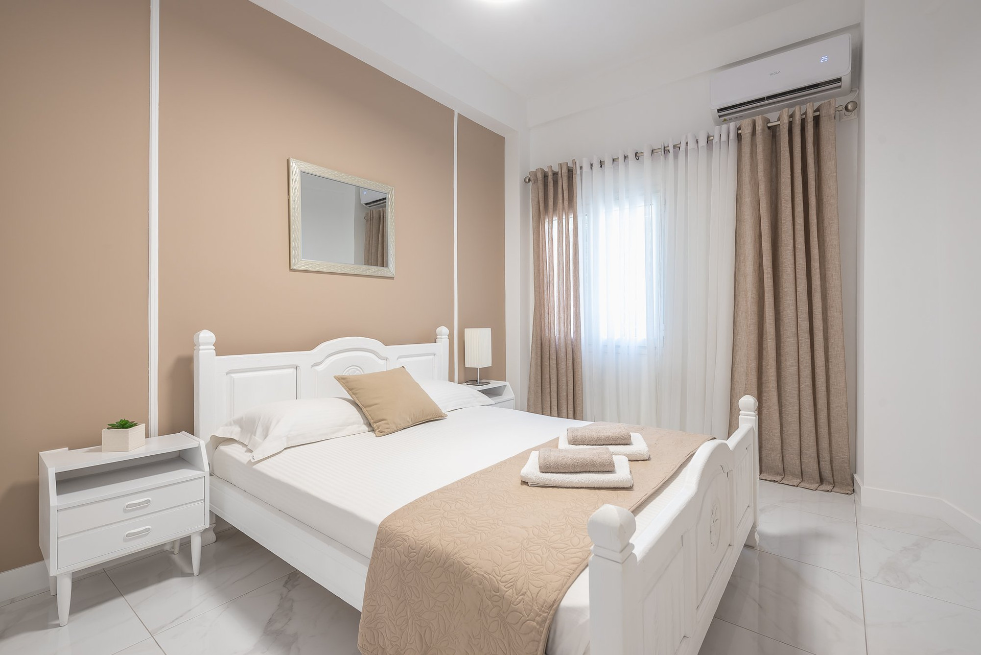 Bedroom with white double bed
