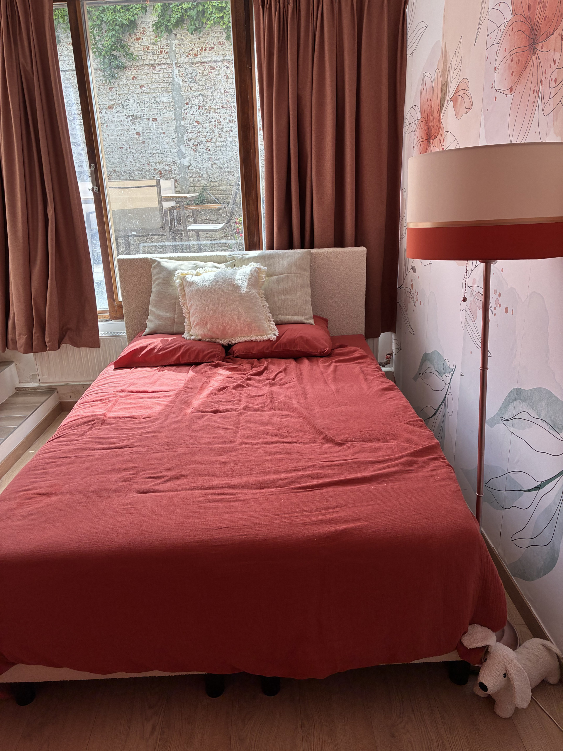 Bedroom with garden view window