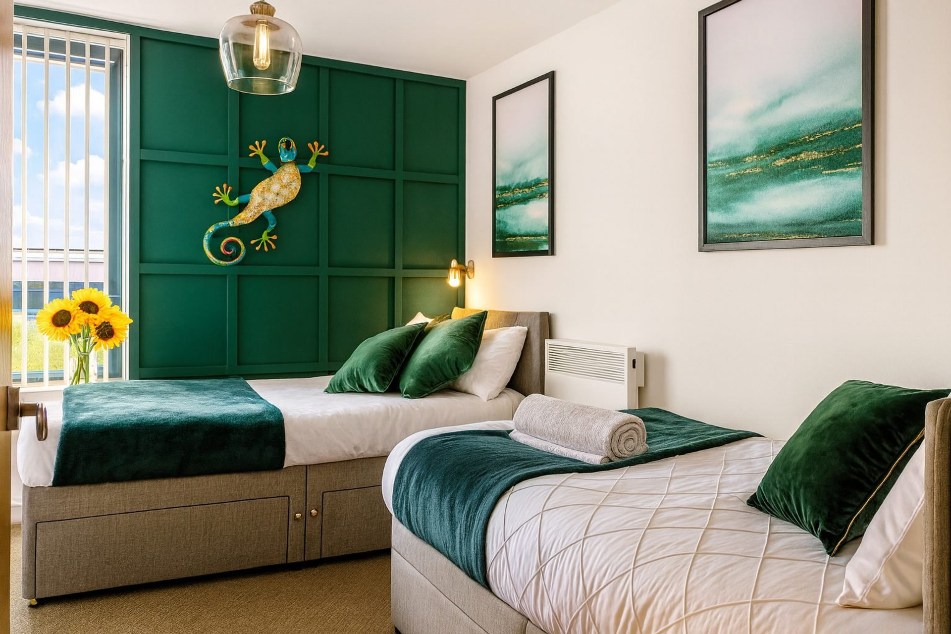 Twin bedroom with green panelling