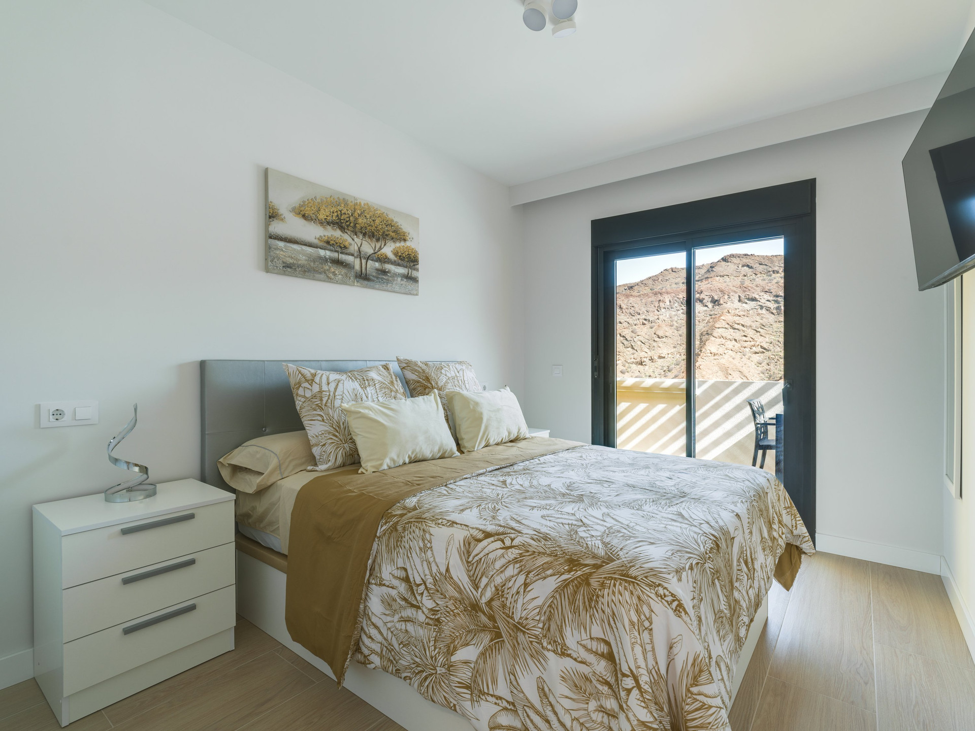 Bedroom with mountain view balcony