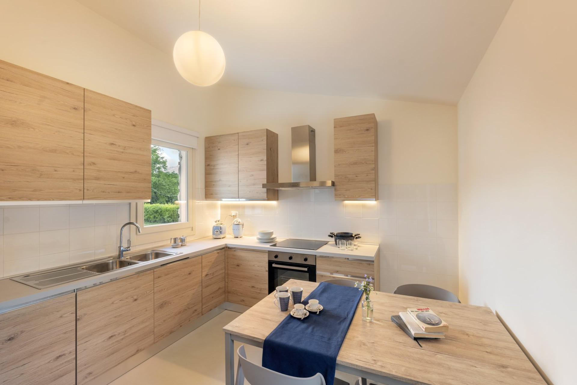 Modern kitchen with dining table