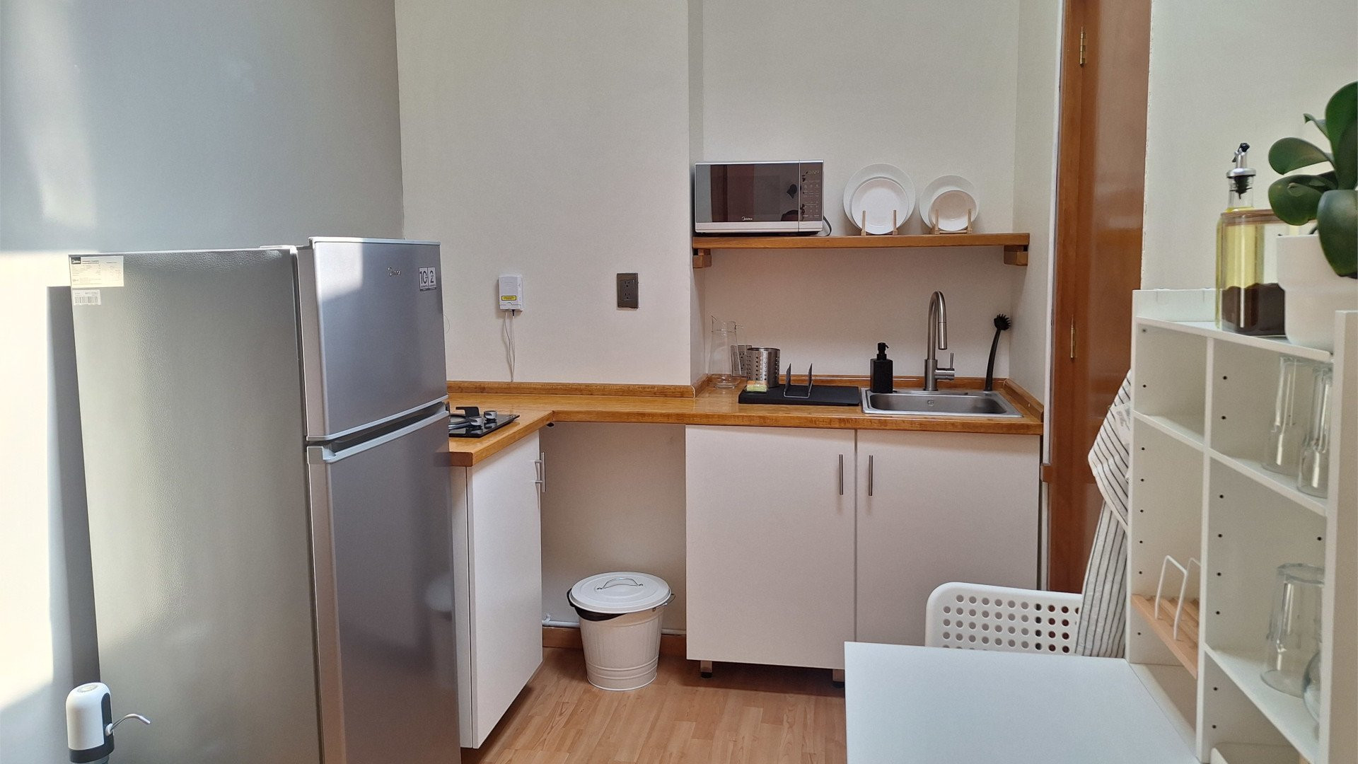 Kitchenette with fridge and microwave