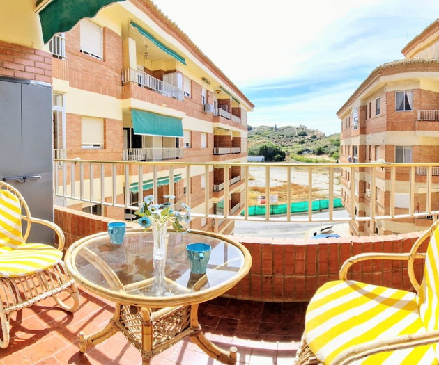 Balcony with seating and building view