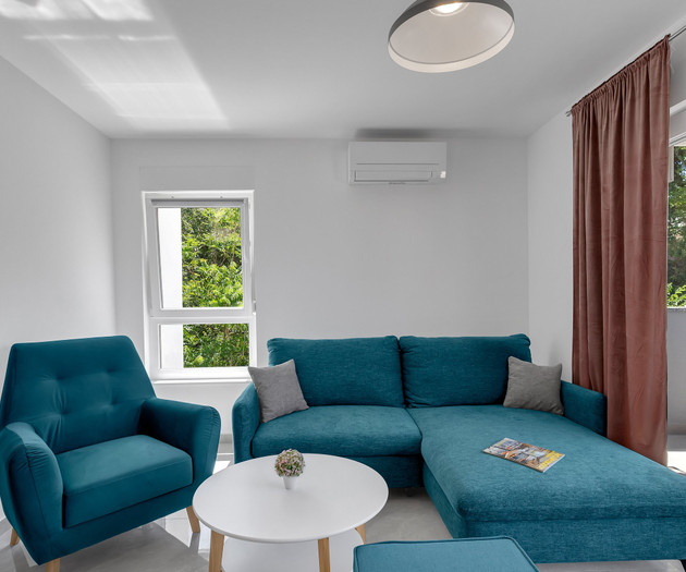 Teal sofa living room corner