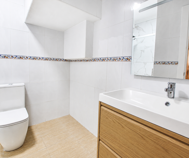 Bathroom with wooden vanity