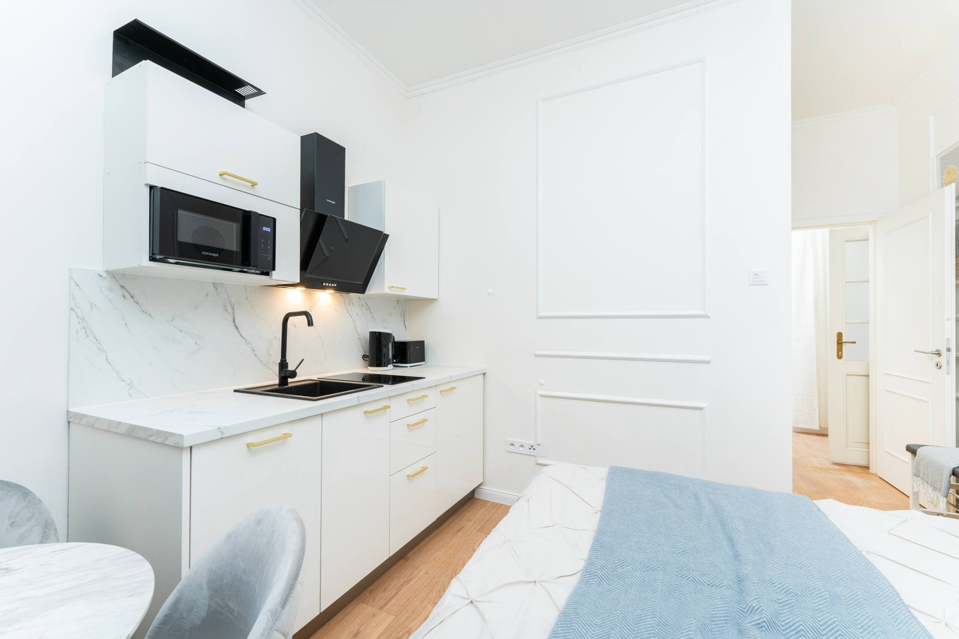 Kitchenette with marble counter