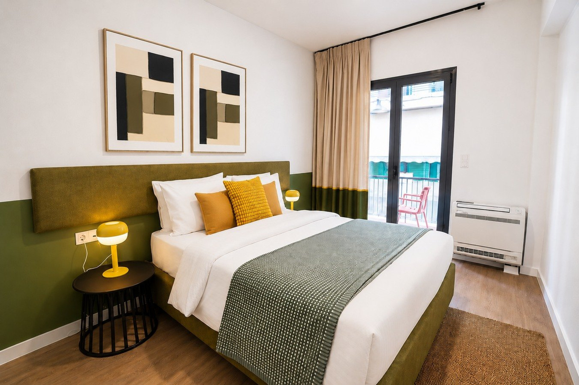 Bedroom with double bed and balcony