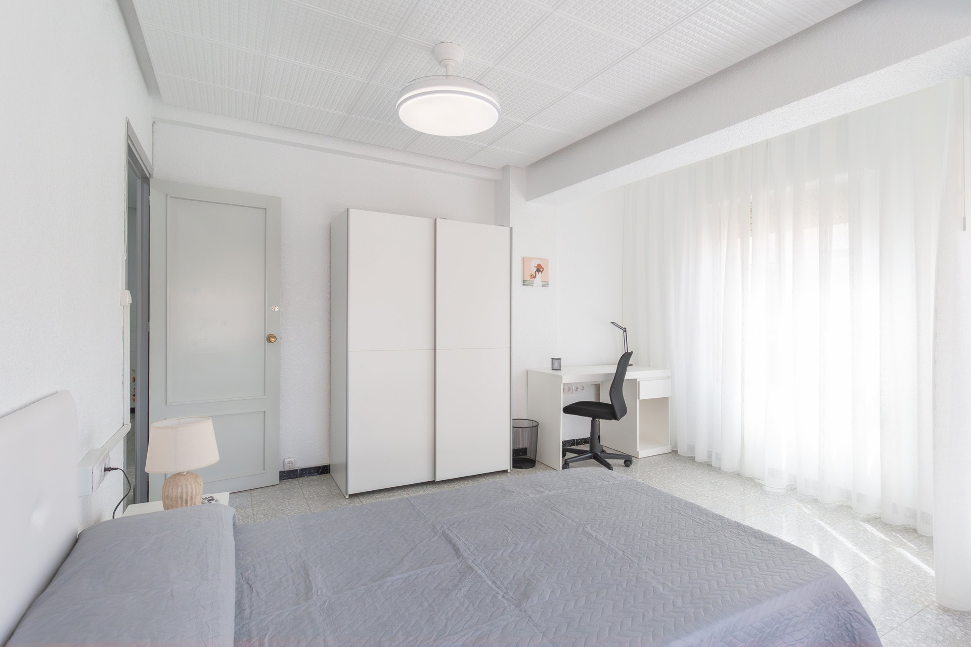 Bedroom with wardrobe and desk