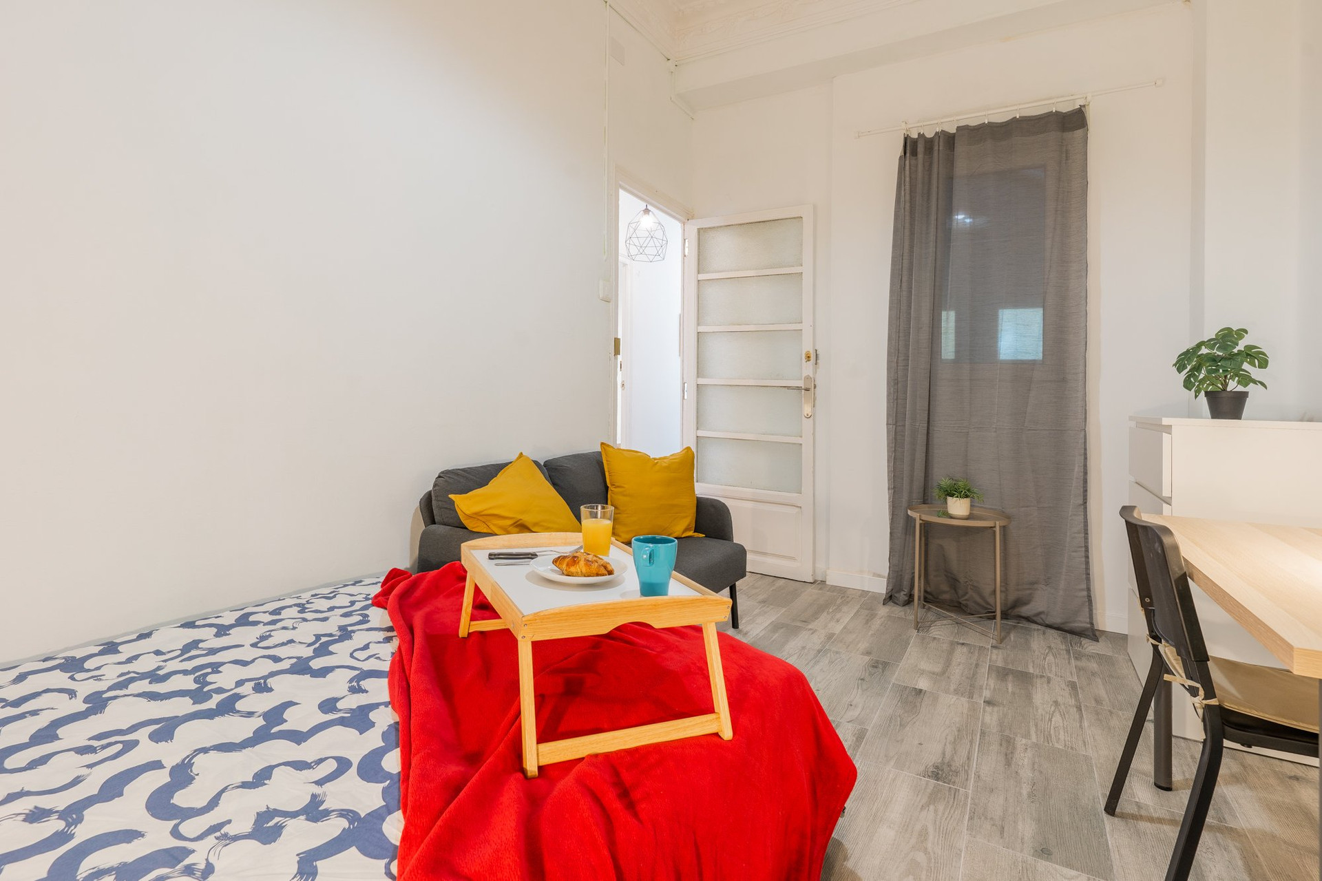Studio room entrance and sofa