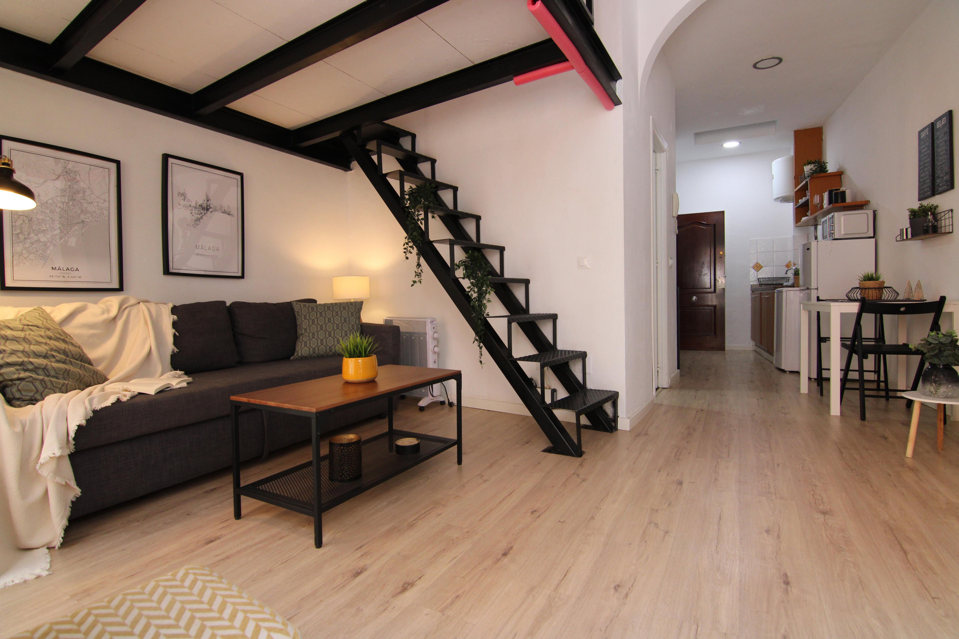 Living room with staircase to loft