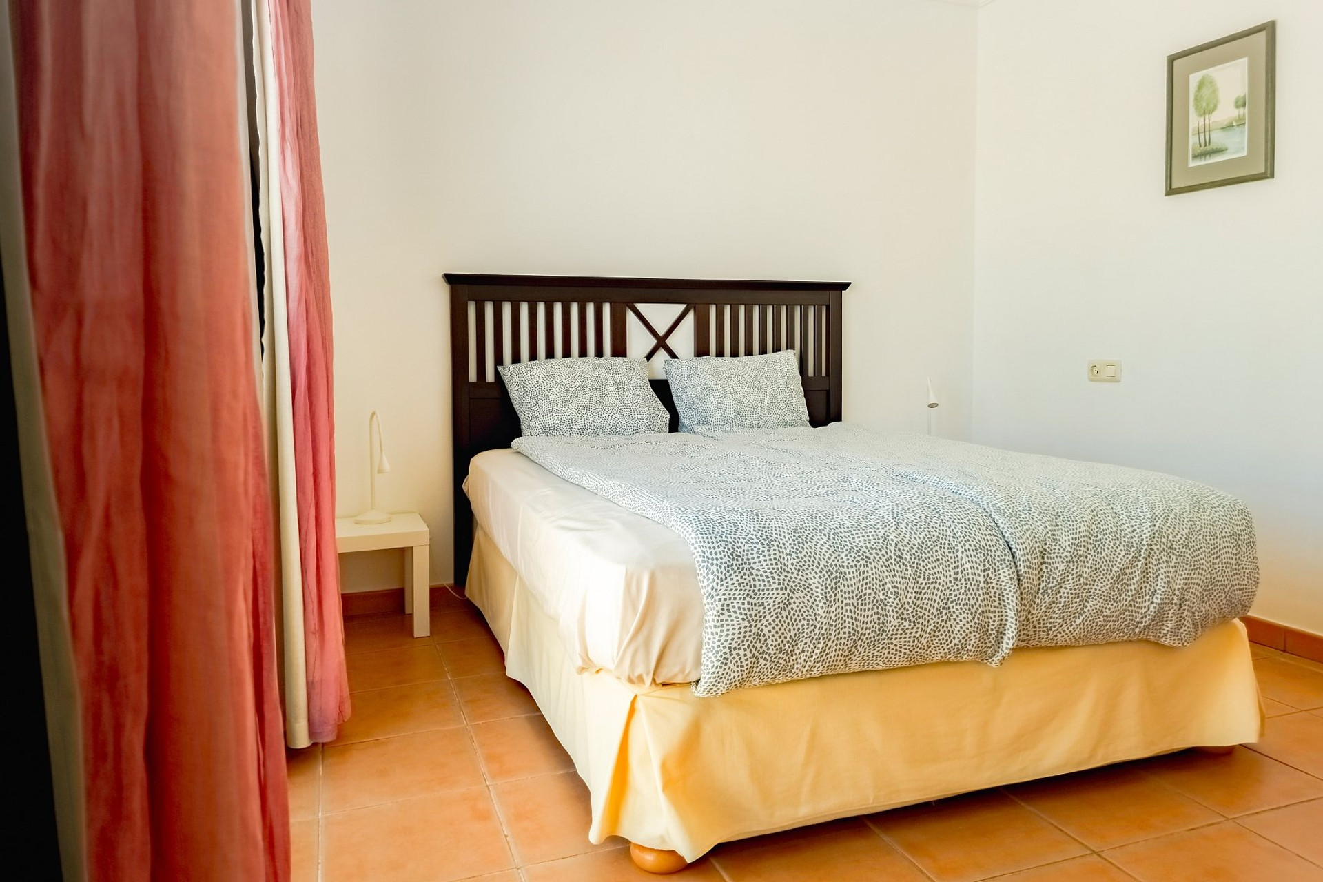 Double bedroom with dark headboard