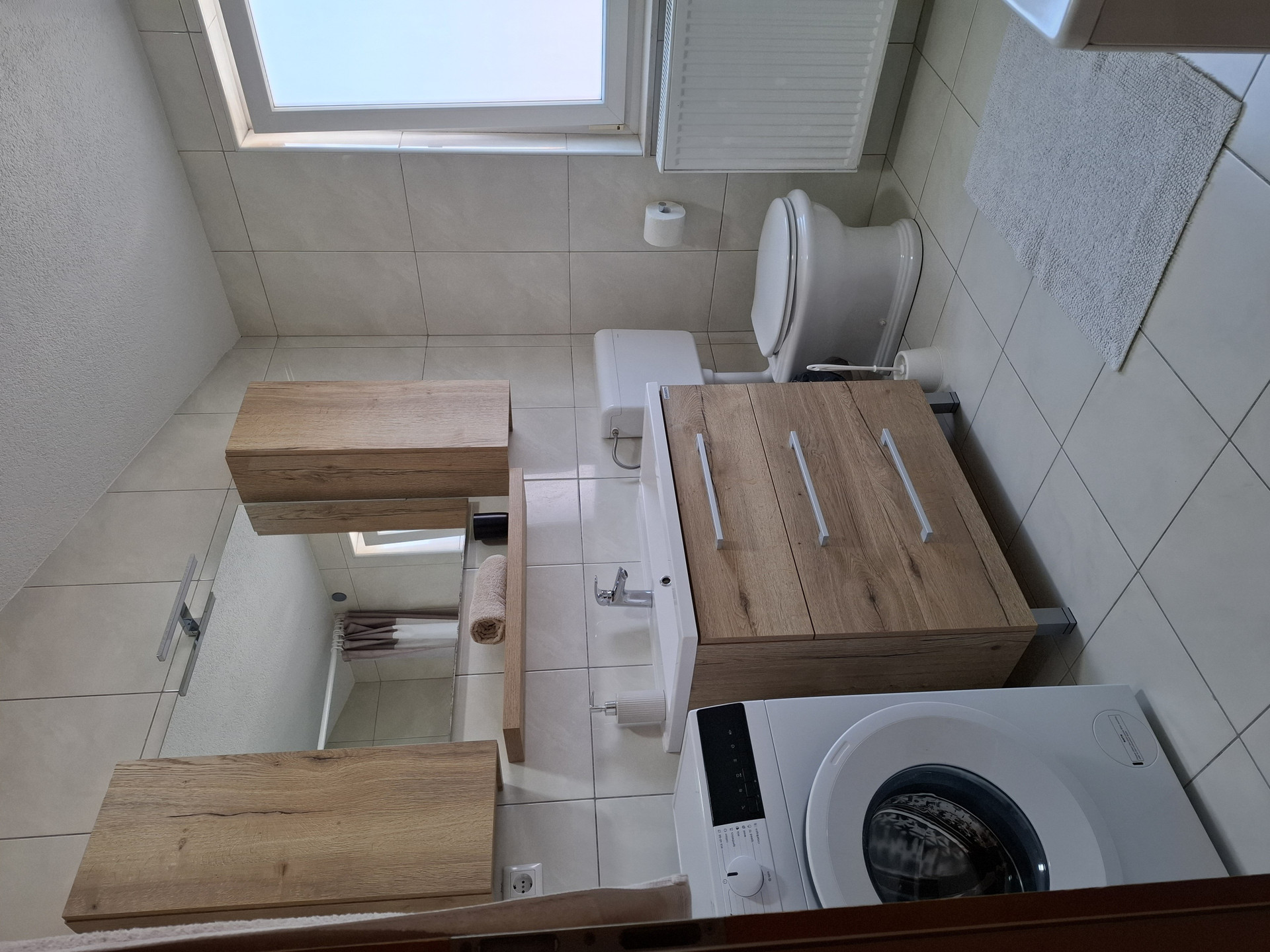 Bathroom with washing machine