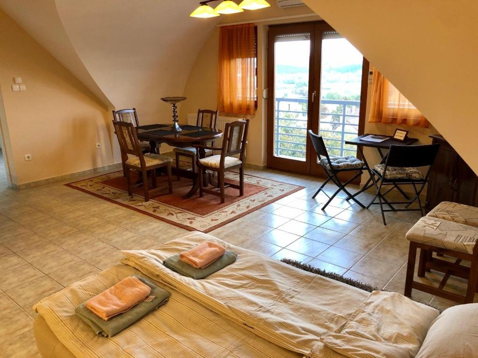 Attic living area with dining table