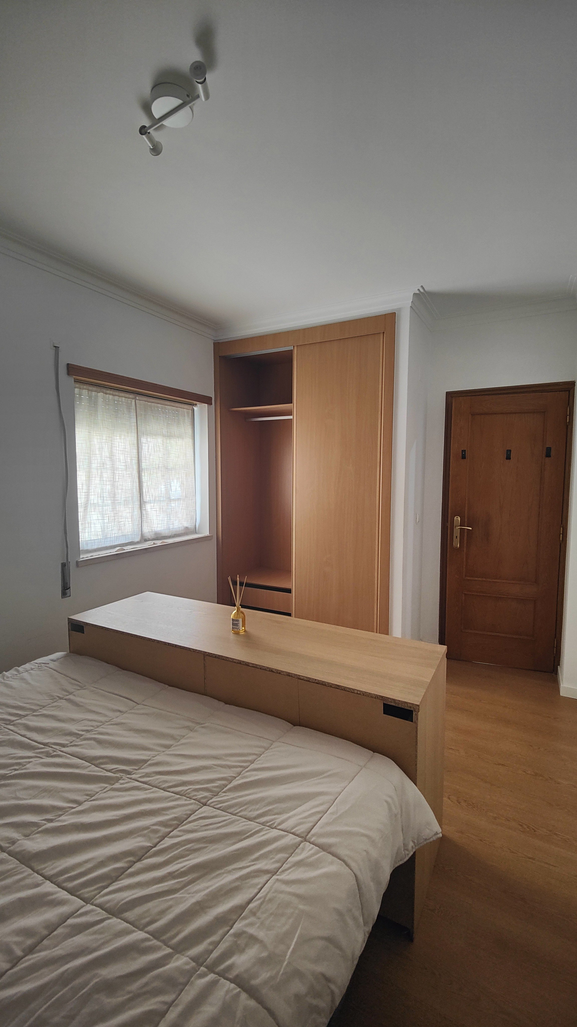 Bedroom with wardrobe and desk